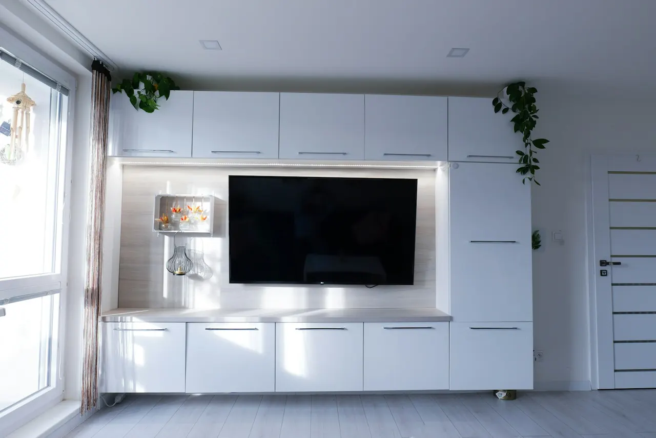 White wall unit around a television